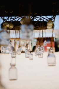 hanging glass jars at desert wedding joshua tree