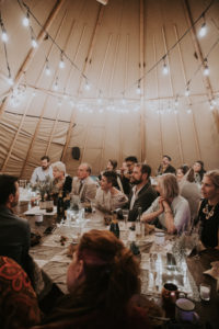 Inside a Stout teepee for an intimate wedding at Black rock desert. Burning man inspired wedding on The playa