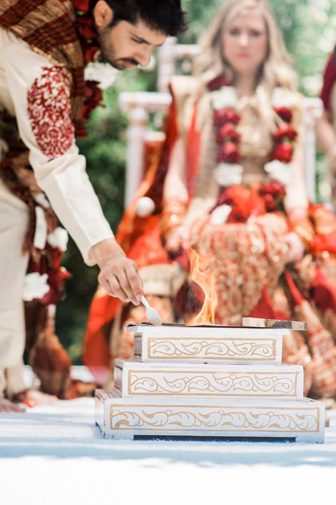 traditional hindu ceremony in garden fusion wedding
