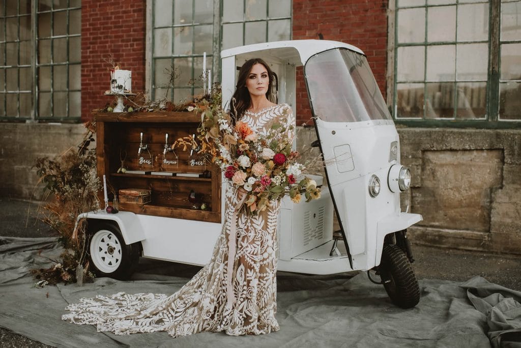 Boho bride with fall bouquet for Halloween wedding